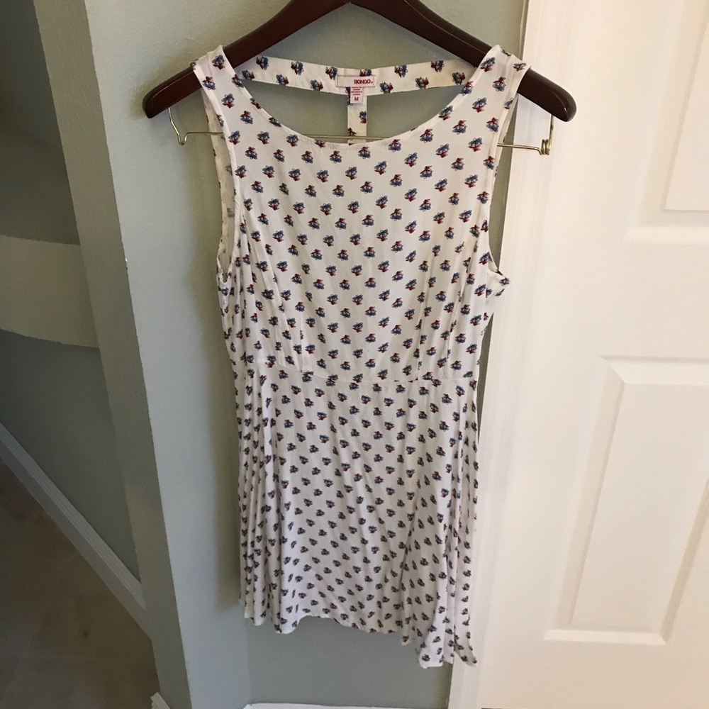White dress with red and blue flower pattern